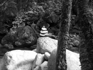Emmafeltmovedtomakealittlerocksculptureduringoneof her riverstops